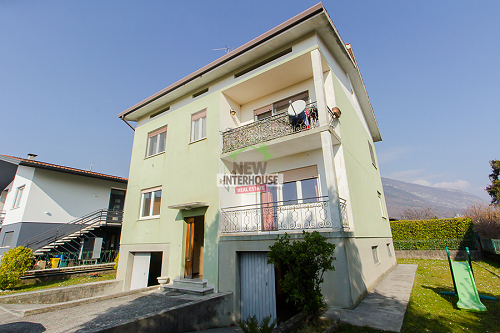 Bifamiliare con garage e giardino privato