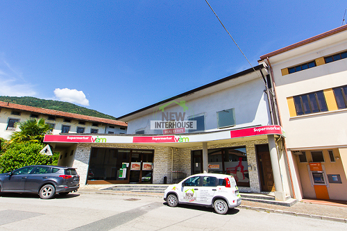 Locale commerciale e appartamento al grezzo